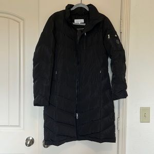 Heavyweight black Calvin Klein thigh-length puffer jacket, with faux fur hood!